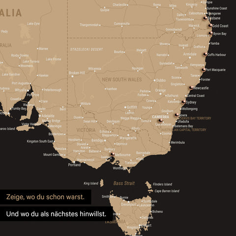 Ausschnitt einer Landkarte von Australien in Farbe Sonar Black (Schwarz-Gold) mit Pins zur Markierung von besuchten Reisezielen