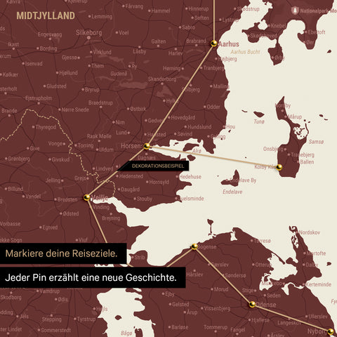 Detailed Denmark map as a pinboard canvas in Bordeaux red, with travel destinations in Central Jutland marked with pins and a travel route depicted with string