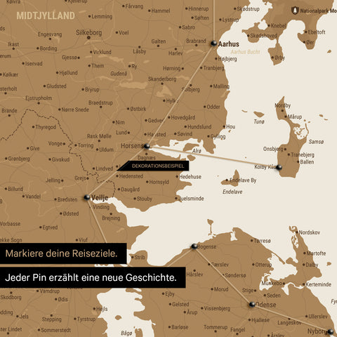 Detailed map of Denmark as a bronze-colored pinboard canvas, featuring travel destinations in Central Jutland marked with pins and a travel route depicted with yarn