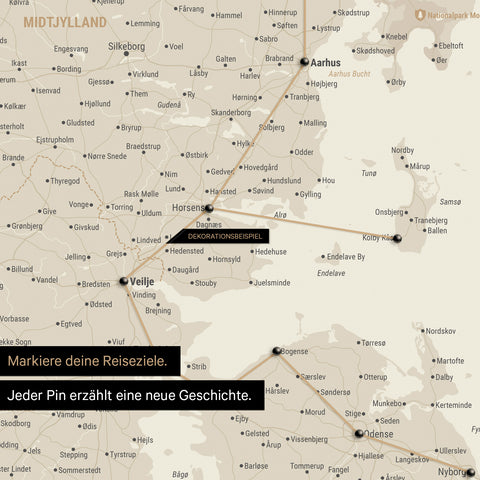 Detailed map of Denmark as a gold-colored pinboard canvas, with travel destinations in Central Jutland marked with pins and a travel route depicted with string