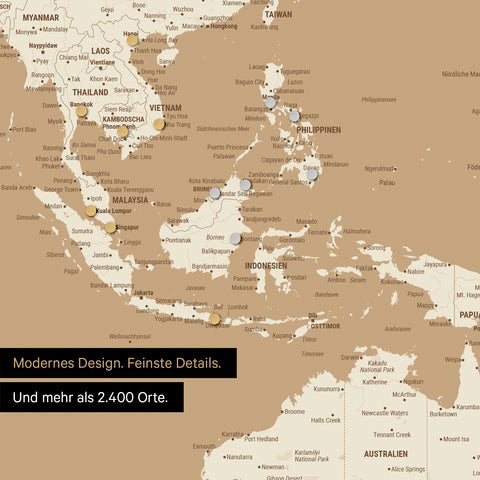 Ausschnitt einer magnetischen Weltkarte in Treasure Gold zeigt Karte von Asien, auf der Magnete Reiseziele markieren