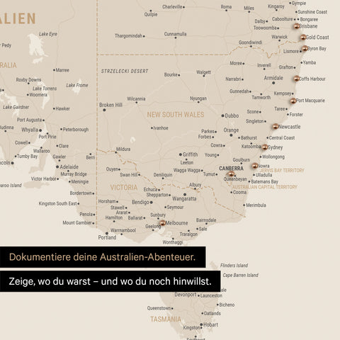 Ausschnitt einer Landkarte von Australien in Farbe Gold mit Pins zur Markierung von besuchten Reisezielen