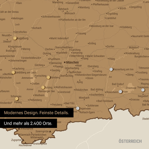 Ausschnitt einer magnetischen Deutschland-Karte in Bronze zeigt Karte von Bayern, auf der Magnete Reiseziele markieren