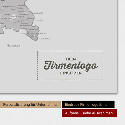 Weltkarte als Deutschland-Karte in Hellgrau mit Eindruck eines Firmenlogos