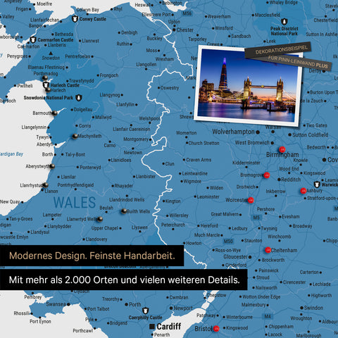 Detail of a map of Wales and England in blue with pins marking visited travel destinations