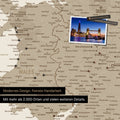Detail of a map of Wales and England in Desert Sand, with pins marking visited destinations