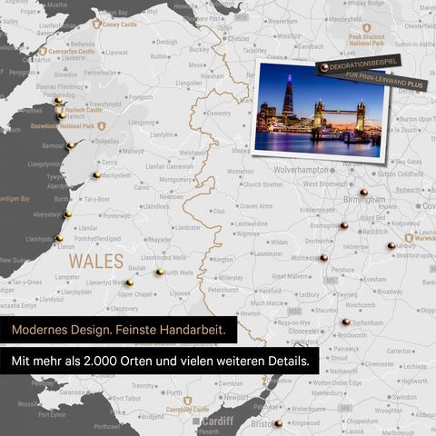 Section of a map of Wales and England in dark gray with pins marking visited destinations