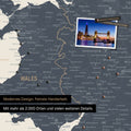 Close-up of a map of Wales and England in Navy Light with pins to mark visited travel destinations