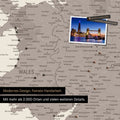 Section of a map of Wales and England in warm gray with pins to mark visited destinations