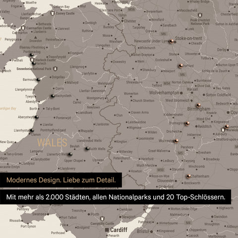 Ausschnitt einer Landkarte von Wales und England in Farbe Warmgray (Braun-Grau) mit Pins zur Markierung von besuchten Reisezielen