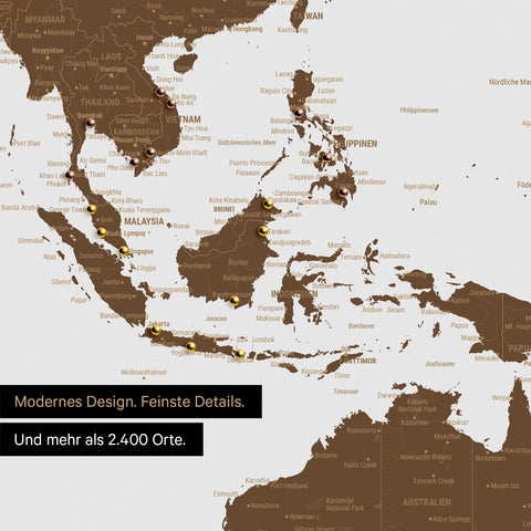 Ausschnitt einer Weltkarte in Braun zeigt Karte von Südost-Asien mit Pins von besuchten Reisezielen