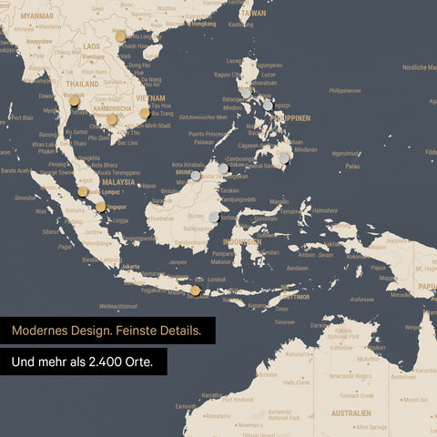 Ausschnitt einer magnetischen Weltkarte in Hale Navy (Blau Gold) zeigt Karte von Asien, auf der Magnete Reiseziele markieren