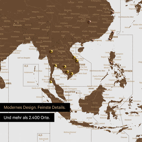 Ausschnitt einer Zeitzonen-Weltkarte in Farbe Braun zeigt Karte von Asien und verschieden farbigen Pins zur Markierung von besuchten Reisezielen
